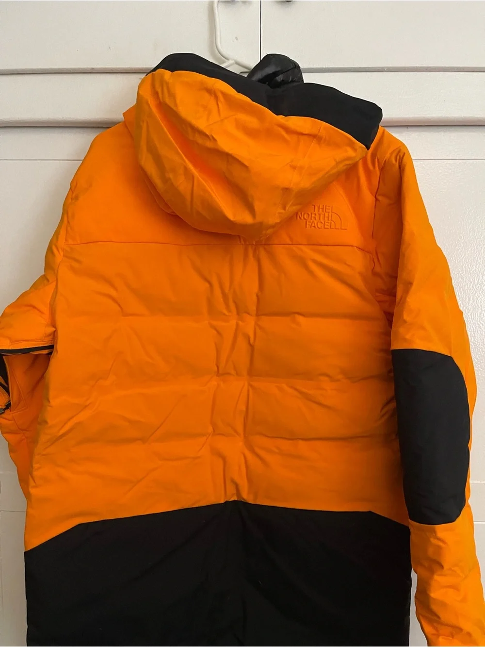 The North Face Men’s Orange and Black Hooded Puffer Jacket